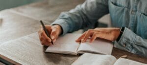 CMA의 숨겨진 장점과 커리어 효과 2 Studying for an Exam writing on a notebook