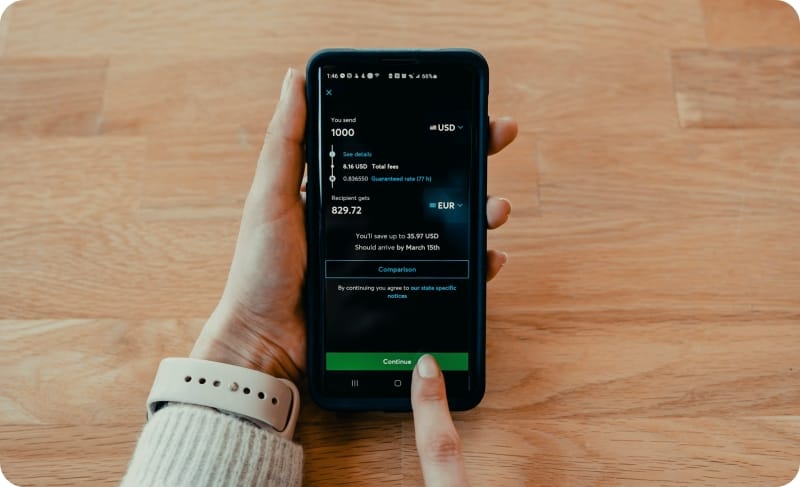 sending money with a money transfer app in a cellphone